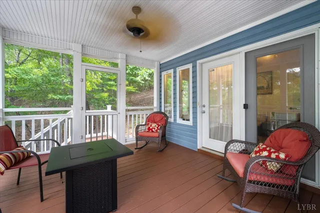 a bedroom with a bed and a flat tv screen