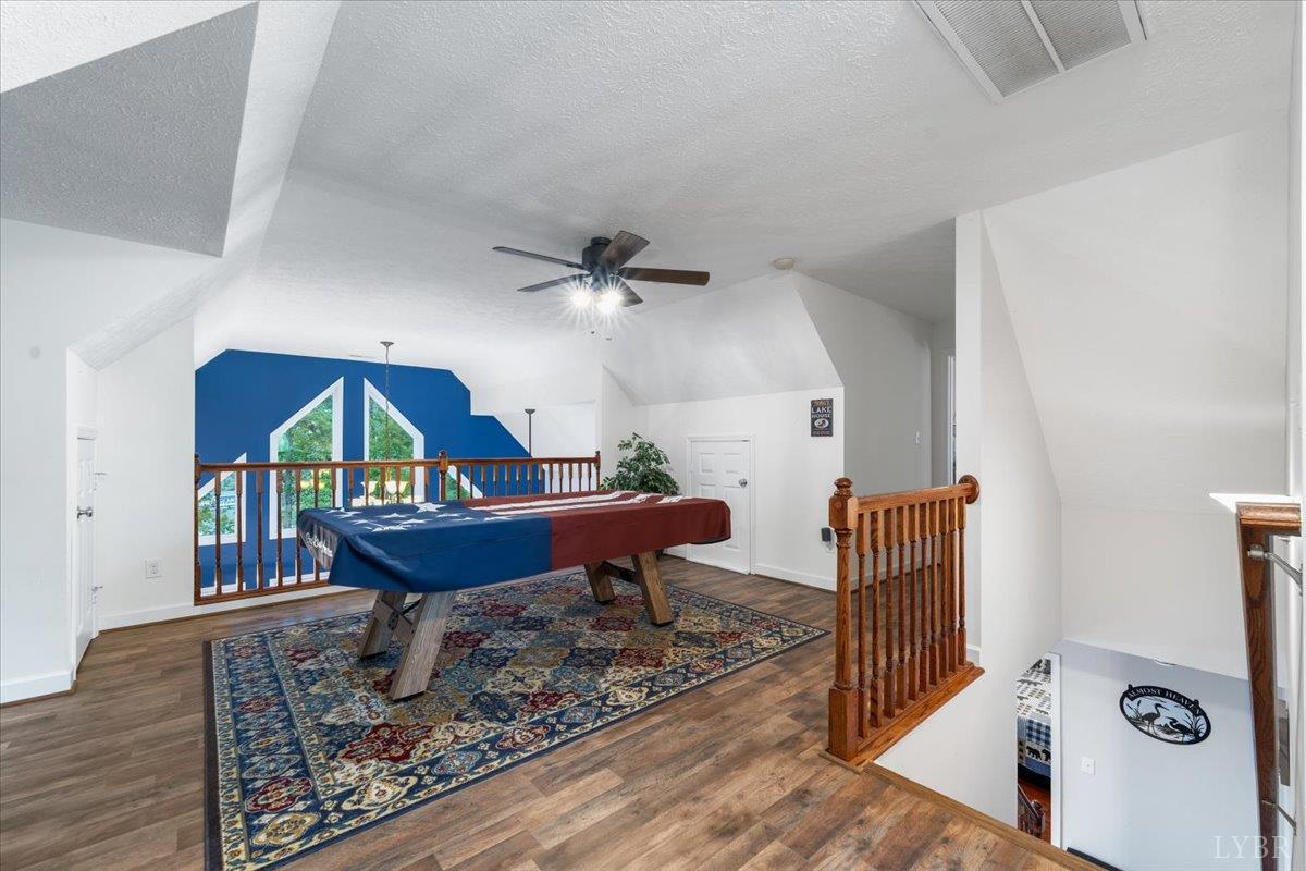 1765 Heron Pointe Drive Gretna, VA 24557 - Photo 30 of 64 a living room with furniture and a table