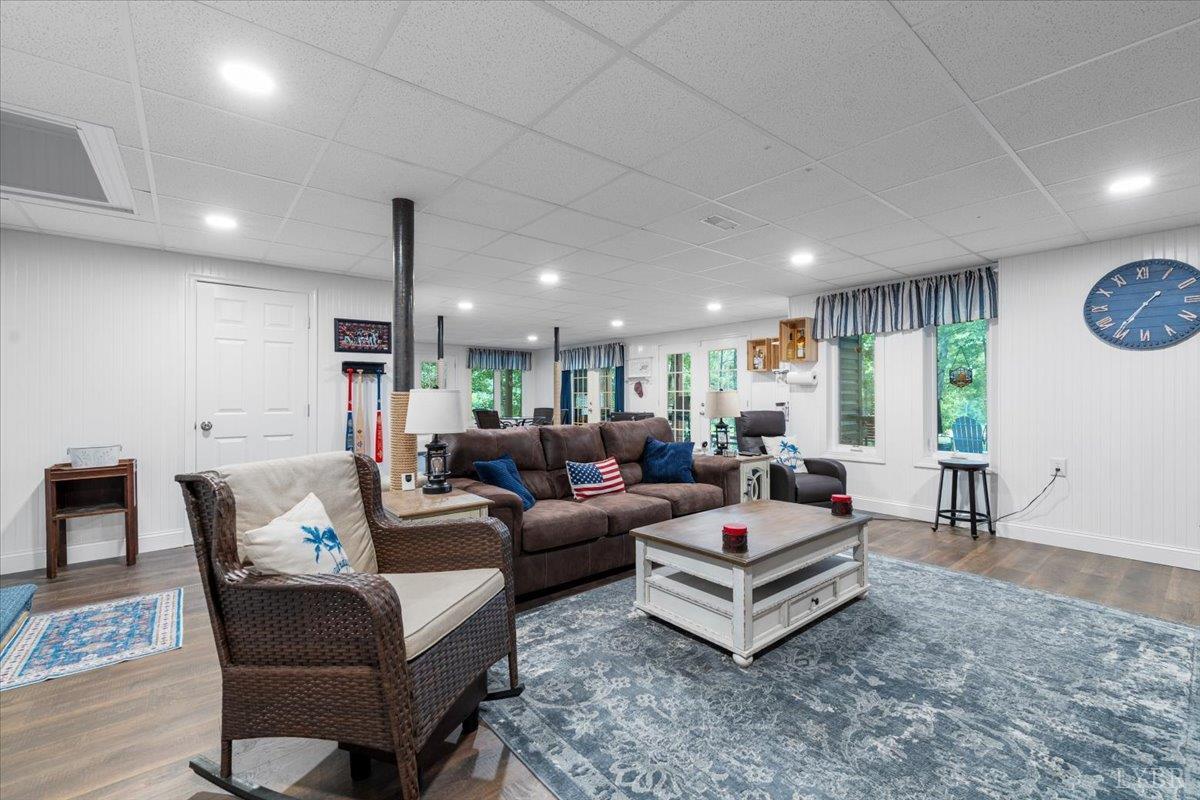 1765 Heron Pointe Drive Gretna, VA 24557 - Photo 38 of 64 a living room with furniture and a wooden floor