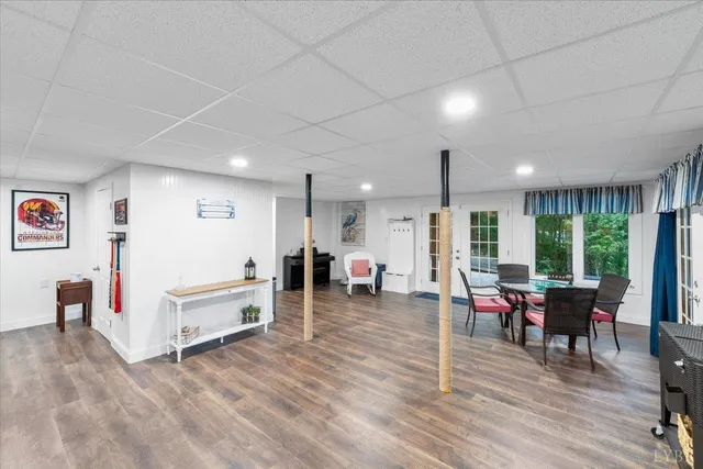 a bathroom with a toilet a sink and a mirror