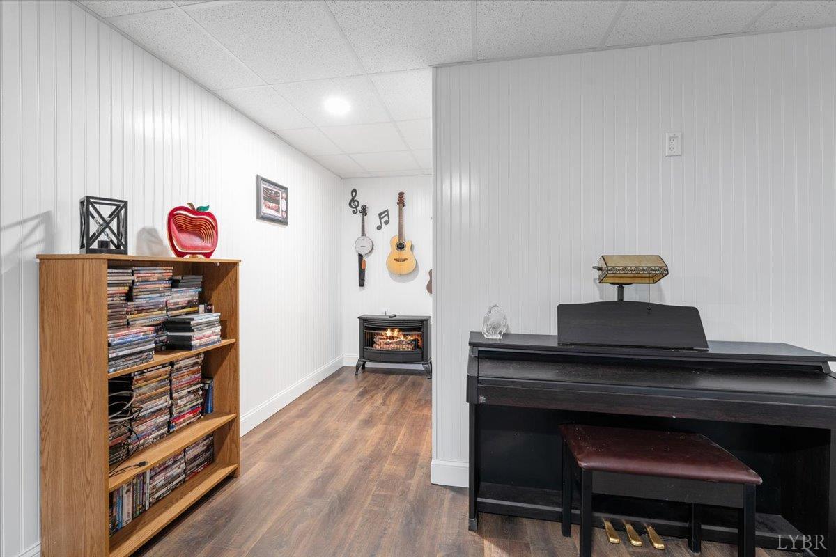 1765 Heron Pointe Drive Gretna, VA 24557 - Photo 45 of 64 a view of a workspace with furniture and wooden floor