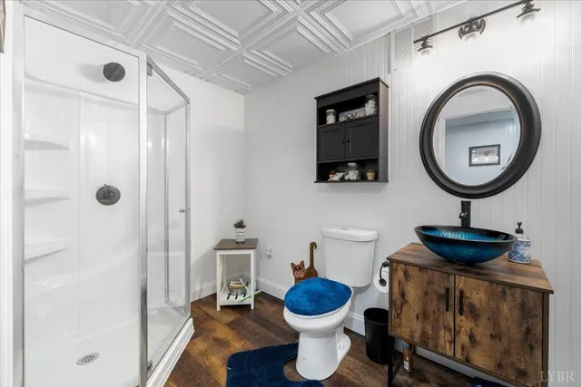 an aerial view of a residential houses with outdoor space and swimming pool