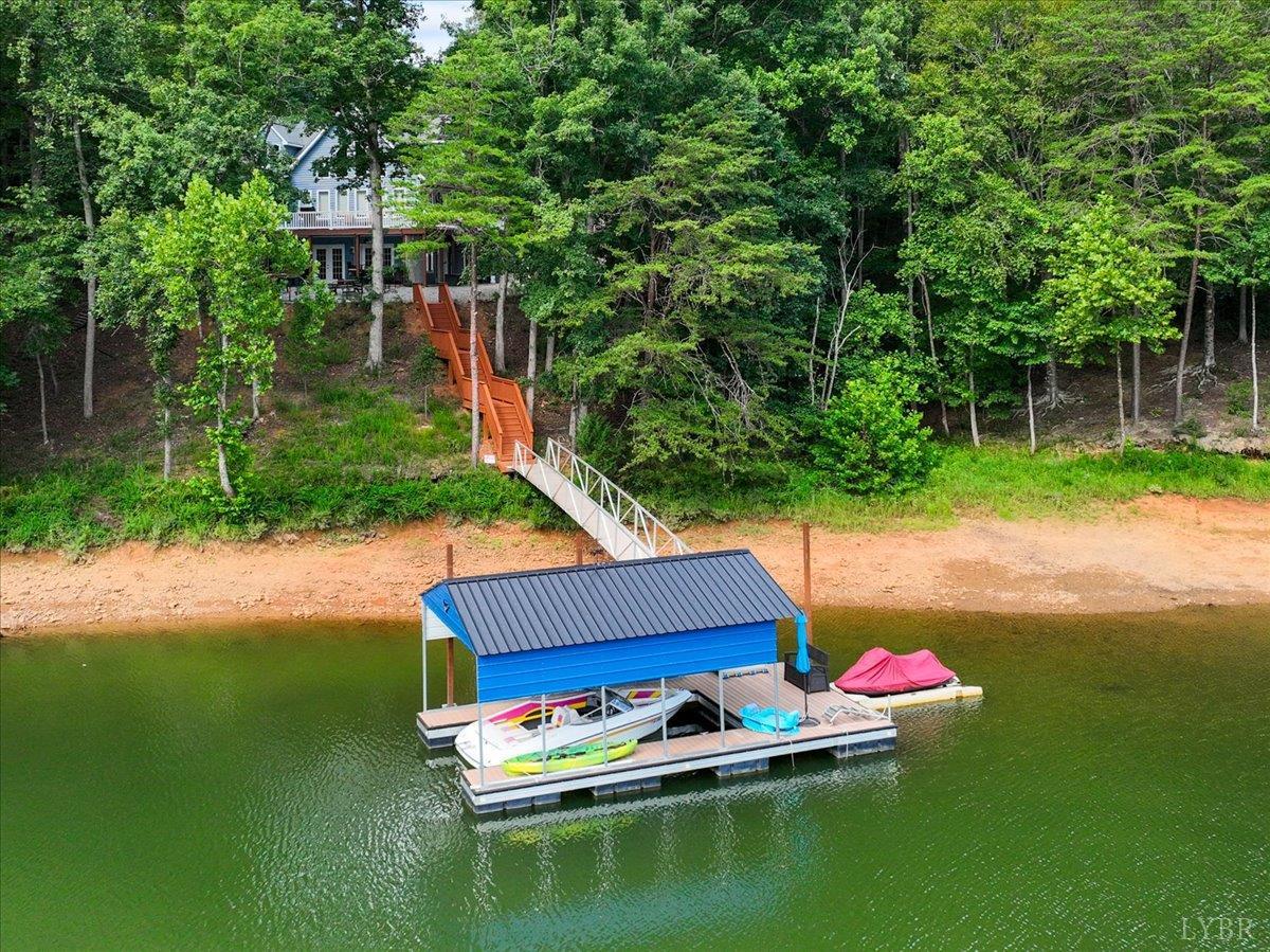 1765 Heron Pointe Drive Gretna, VA 24557 - Photo 51 of 64 a small pool with couple of trees in the background