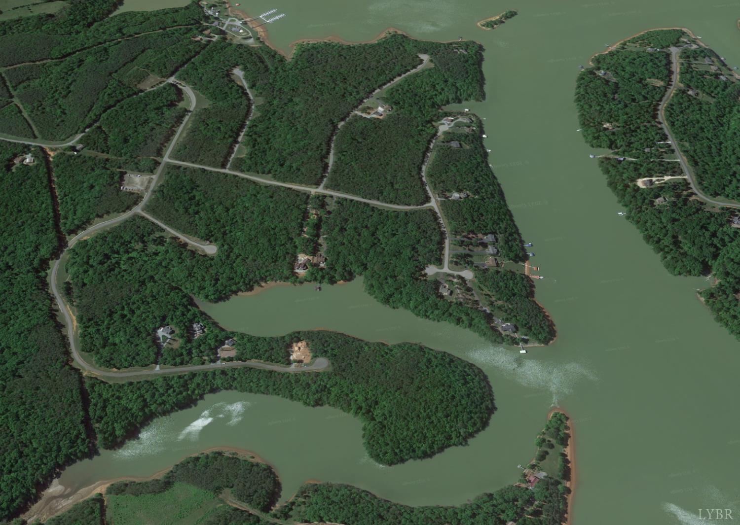 1765 Heron Pointe Drive Gretna, VA 24557 - Photo 59 of 64 an aerial view of a residential houses with outdoor space and swimming pool