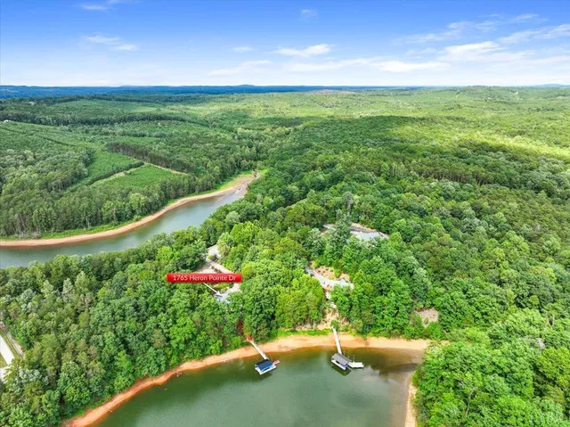 a view of balcony with wooden floor and fence