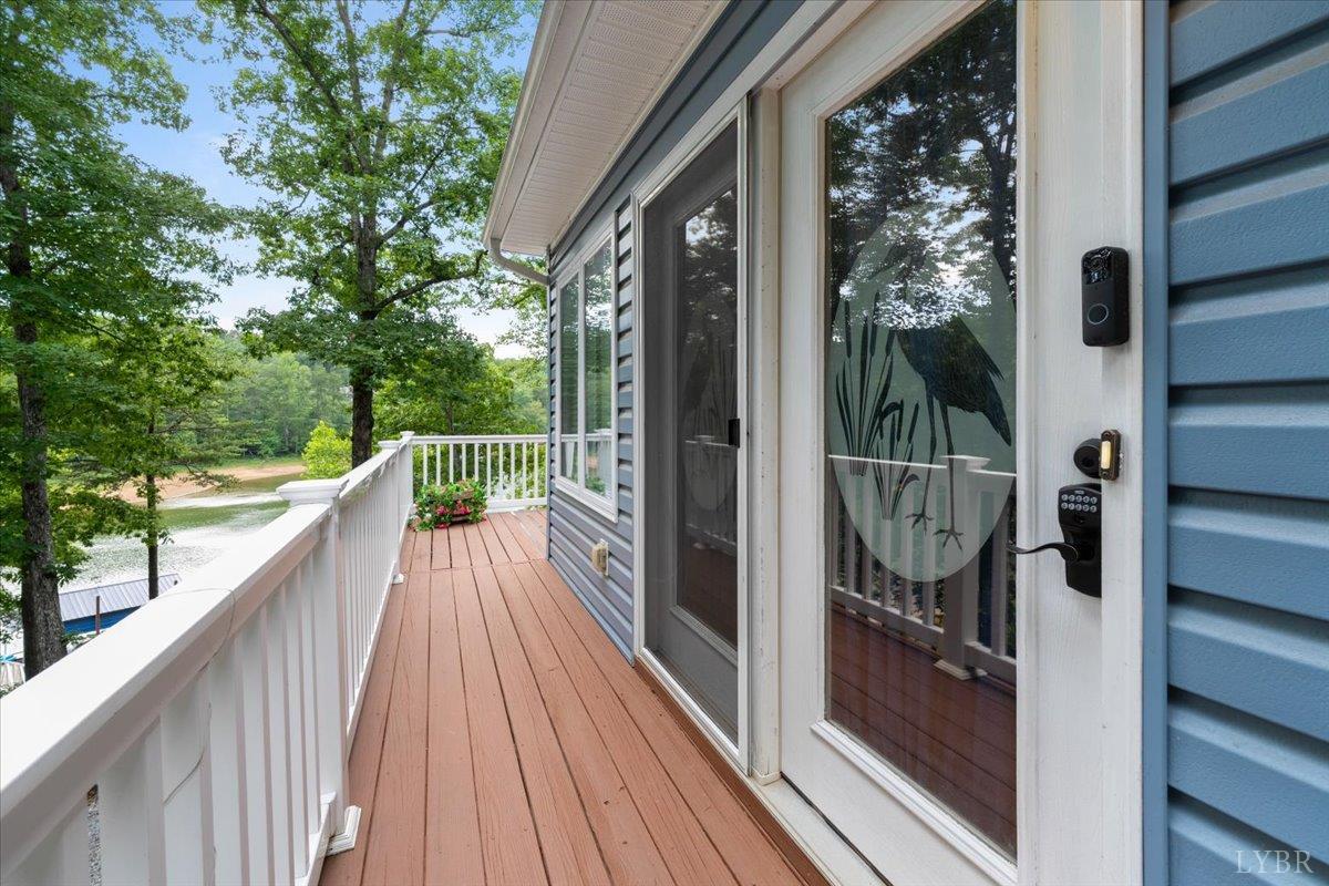 1765 Heron Pointe Drive Gretna, VA 24557 - Photo 8 of 64 a view of balcony with wooden floor and fence