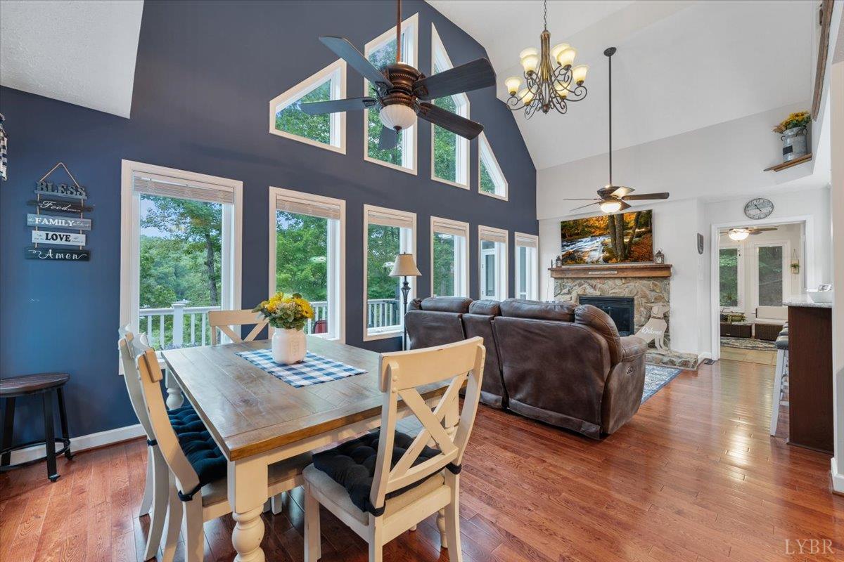 1765 Heron Pointe Drive Gretna, VA 24557 - Photo 9 of 64 a view of a dining room with furniture window and wooden floor