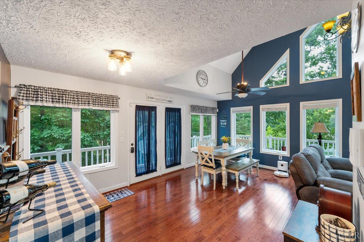 1765 Heron Pointe Drive Gretna, VA 24557 - Photo 10 of 64 a living room with furniture and a large window