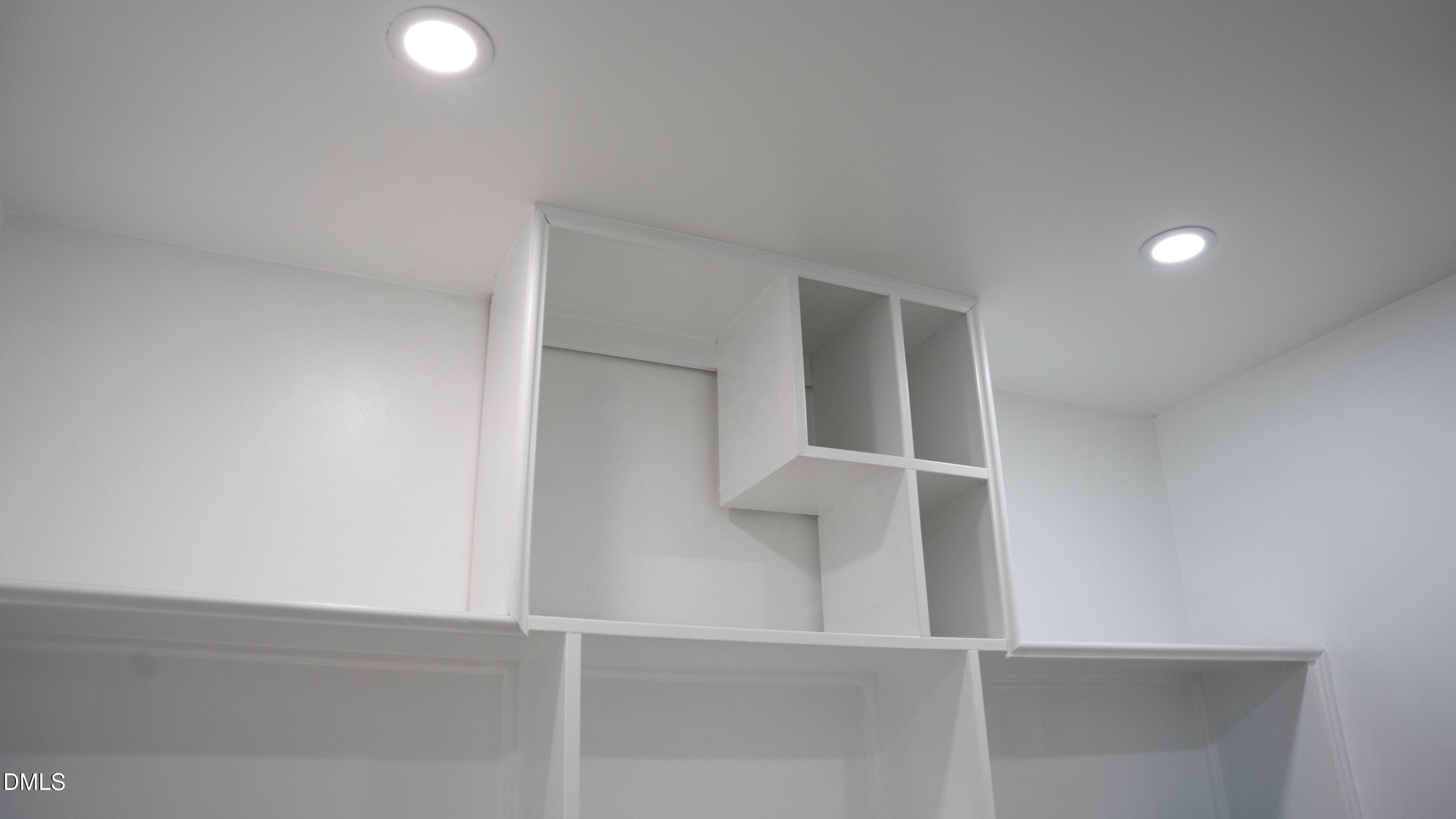 730 NW Boulevard Clinton, NC 28328 - Photo 45 of 68 Custom shelves in laundry room