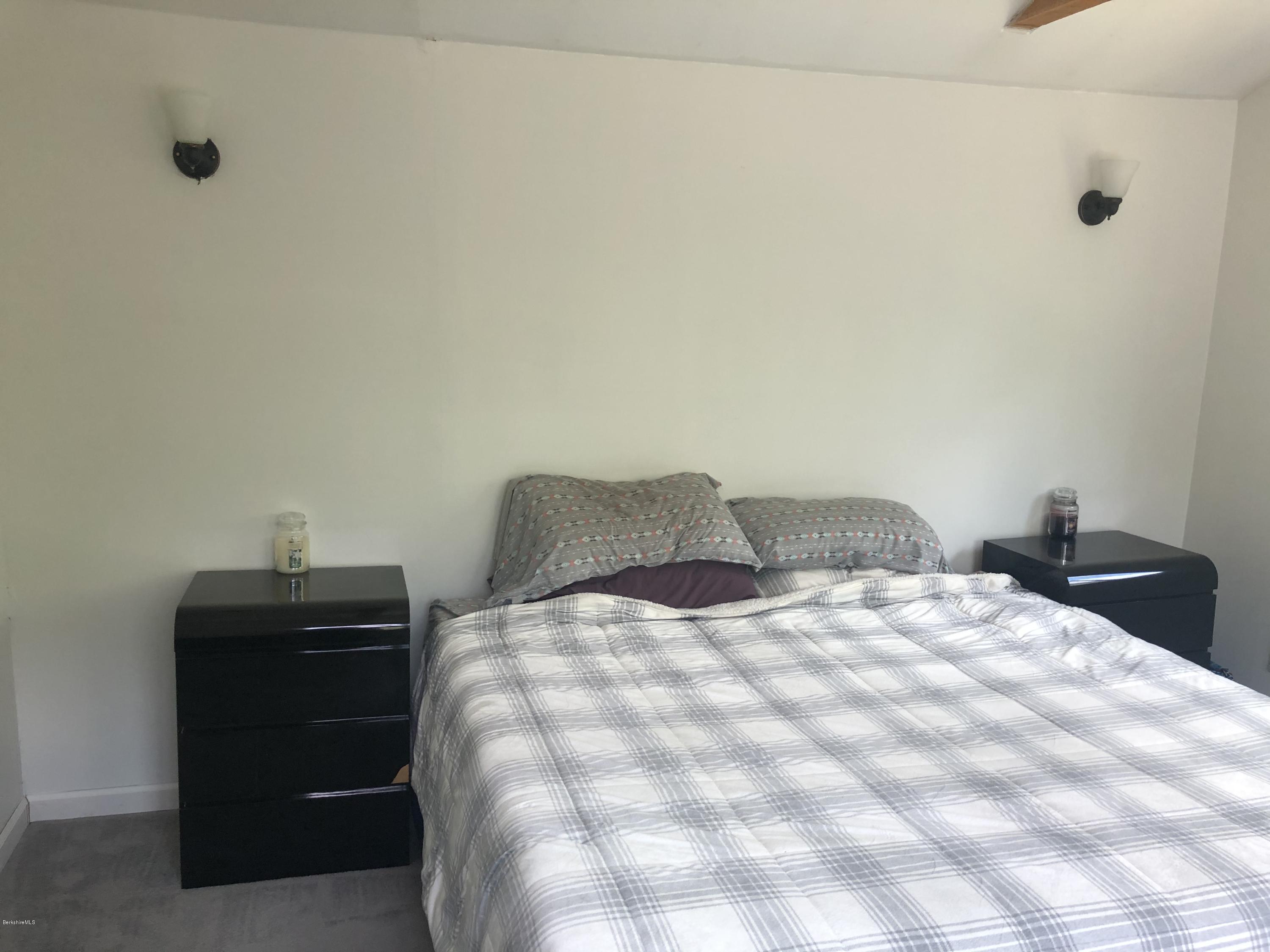 218 Upper Valley Road Washington, MA 01223 - Photo 12 of 33 a bedroom with a bed and a window