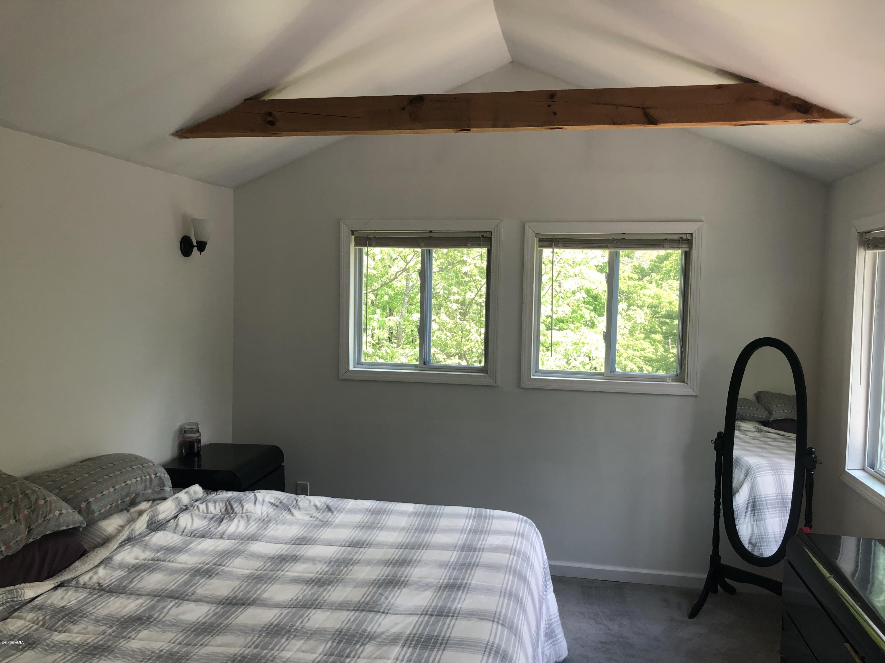 218 Upper Valley Road Washington, MA 01223 - Photo 14 of 33 a bedroom with a bed and a window