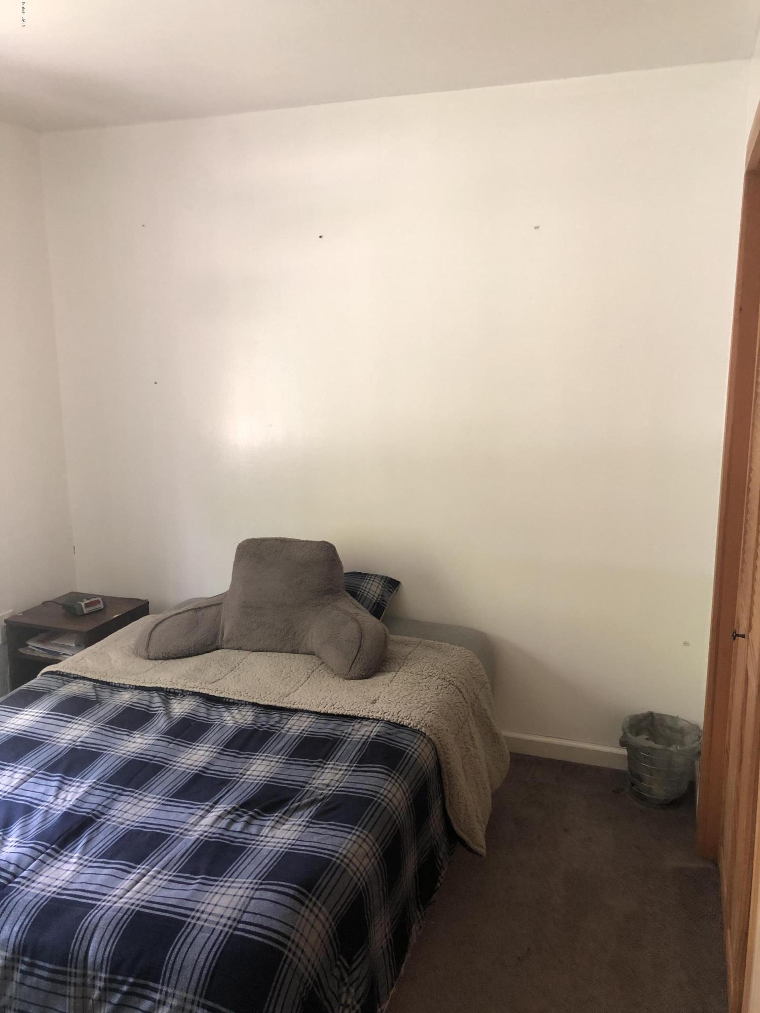 218 Upper Valley Road Washington, MA 01223 - Photo 17 of 33 a bedroom with a bed and a window