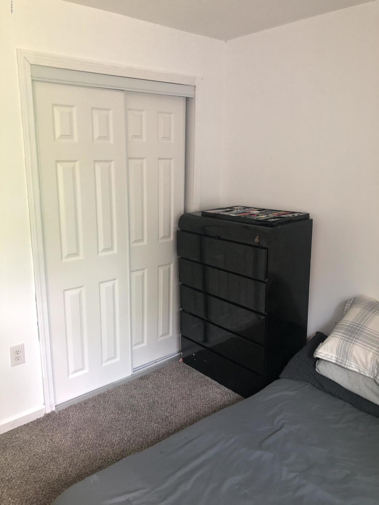 218 Upper Valley Road Washington, MA 01223 - Photo 18 of 33 a room that has a bed and a window
