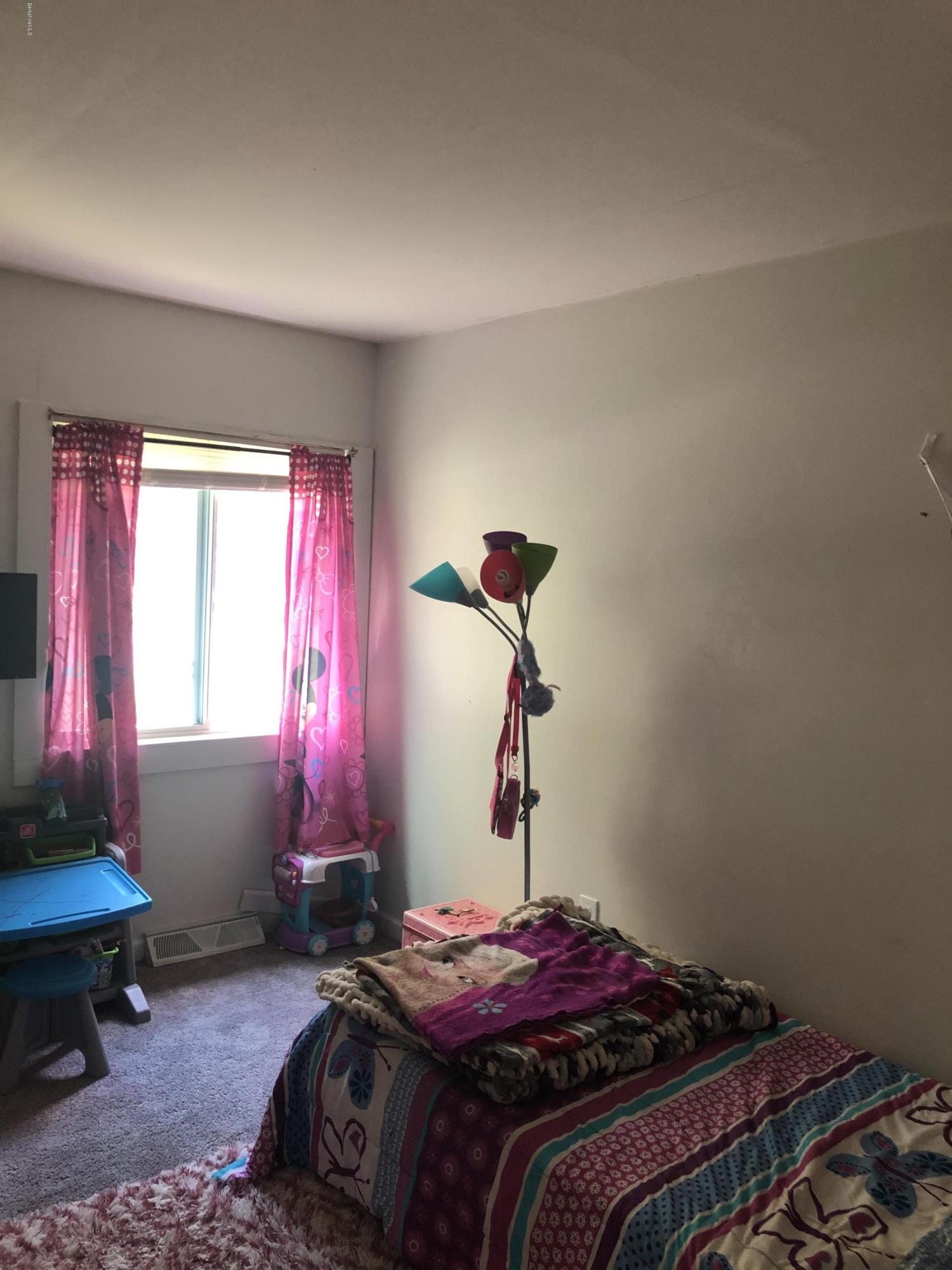 218 Upper Valley Road Washington, MA 01223 - Photo 21 of 33 a bedroom with a bed and a window