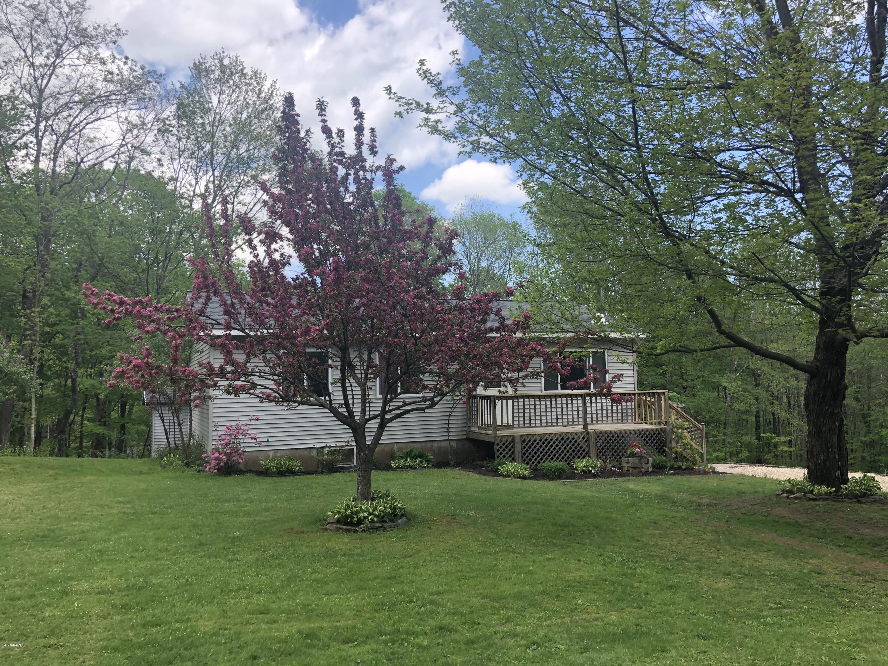 218 Upper Valley Road Washington, MA 01223 - Photo 31 of 33 a front view of a house with a garden