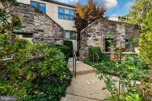 a view of room with wooden floor and floor to ceiling window