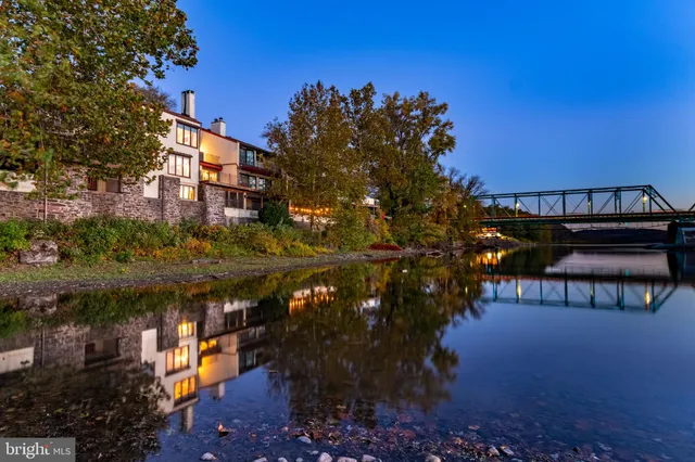 a kitchen with stainless steel appliances a stove and a microwave