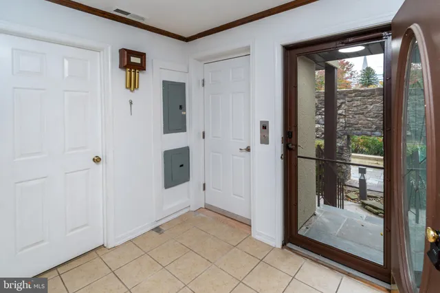 a bathroom with a toilet a sink and a mirror