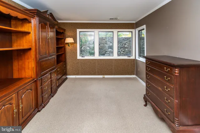 a view of a house with a large window