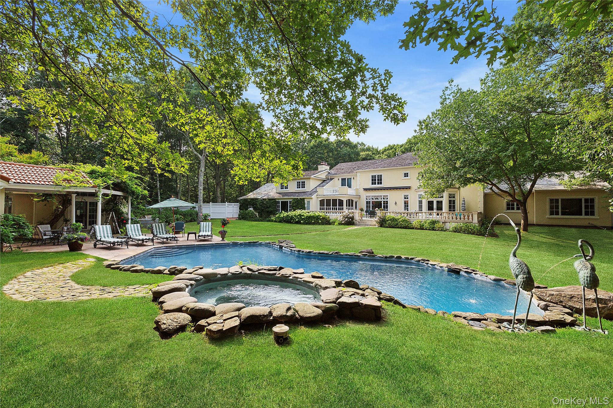 1 Terrys Trail East Hampton, NY 11937 - Photo 23 of 25 Outdoor pool featuring a patio area and an in-ground hot tub