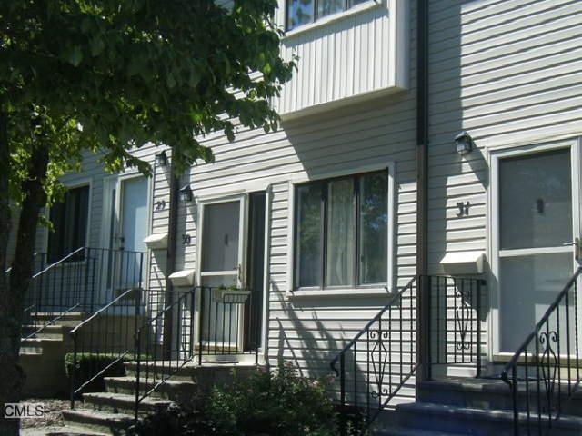 715 Frenchtown Road, Unit 30 Bridgeport, CT 06606 - Photo 1 of 1 a front view of a house with a porch