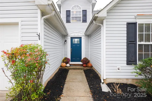 a view of house with patio