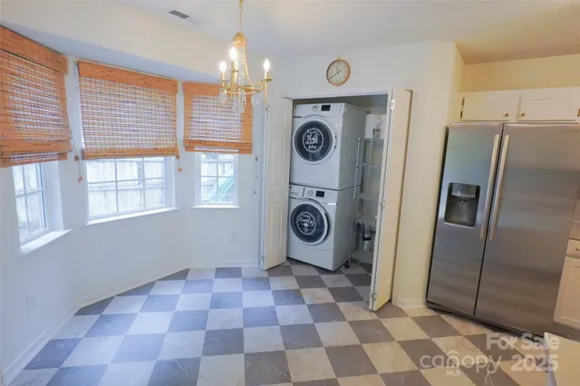 a view of a storage & utility room with washer and dryer
