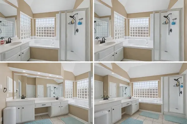 a view of bathroom with tub and window
