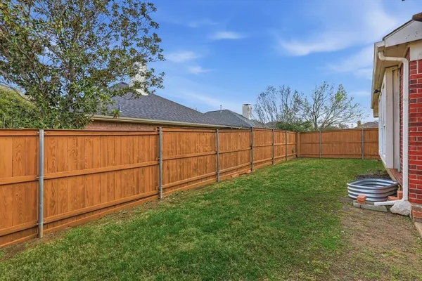 a view of a backyard with a garden