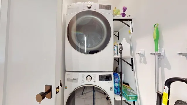 a utility room with dryer and washer