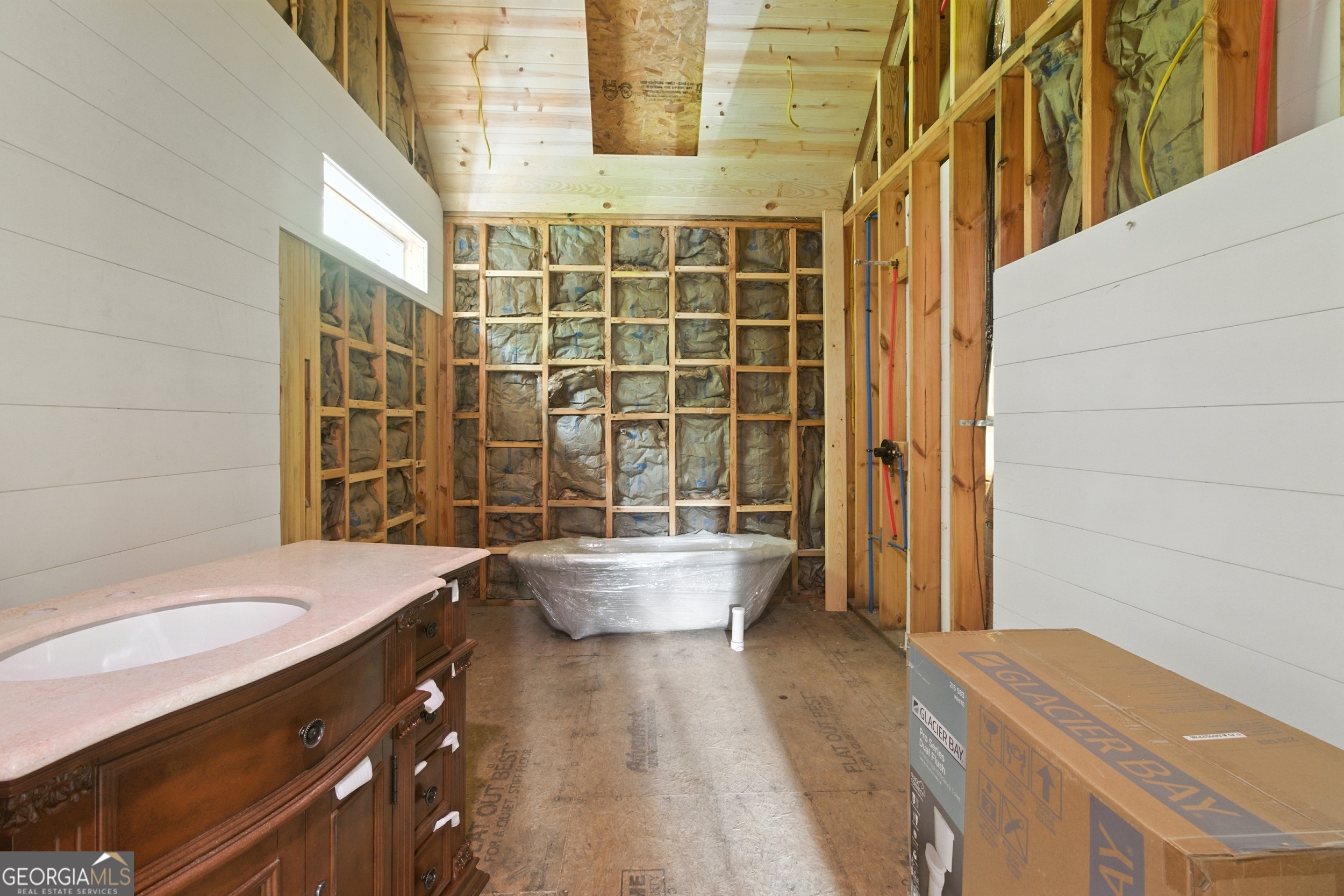 668 Mountainside Drive Rabun Gap, GA 30568 - Photo 14 of 24 a bathroom with a sink and mirror