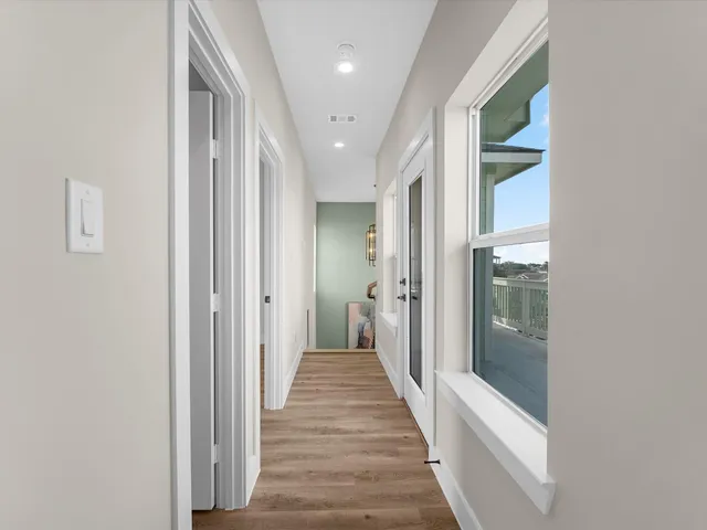 a view of room with window and ceiling fan