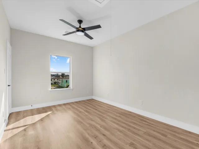 a view of a house with a large window