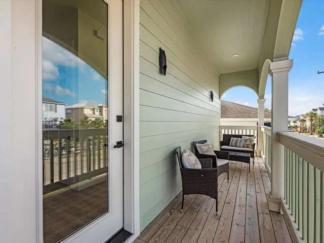 a front view of a house with a yard table and chairs