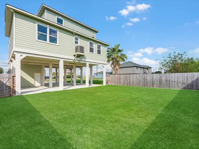 a view of a hall with wooden floor