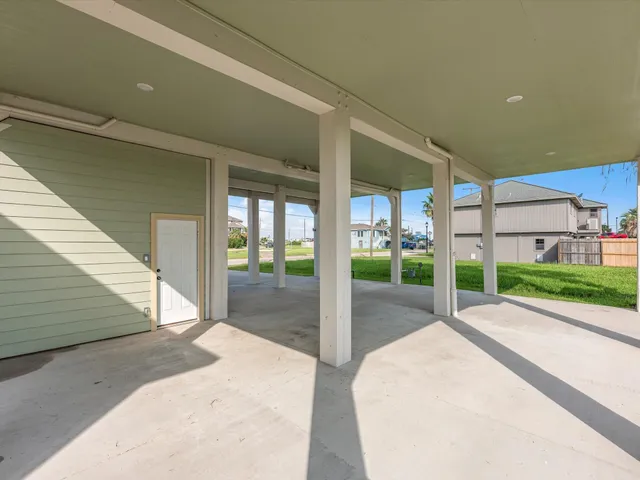 an aerial view of a house with swimming pool