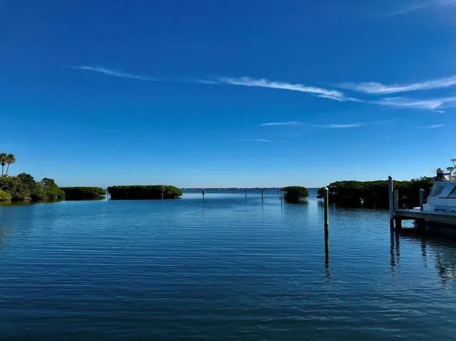 an aerial view of residential building and ocean