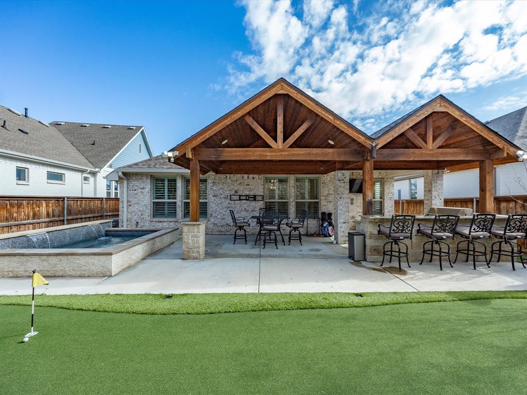 13817 Green Hook Road Fort Worth, TX 76008 - Photo 1 of 40 Back yard oasis with covered patio, outdoor kitchen, putting green, and spa!