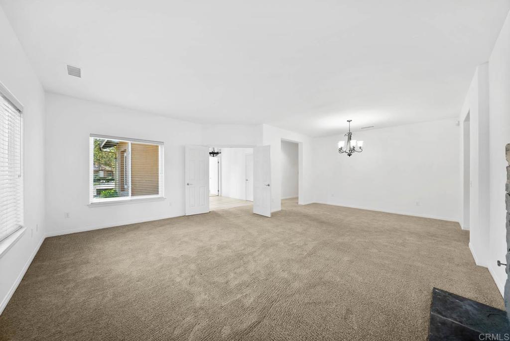 1861 Fox Bridge Court Fallbrook, CA 92028 - Photo 13 of 60 an empty room with windows