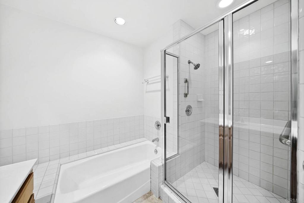 1861 Fox Bridge Court Fallbrook, CA 92028 - Photo 27 of 60 a bathroom with a shower and a bath tub
