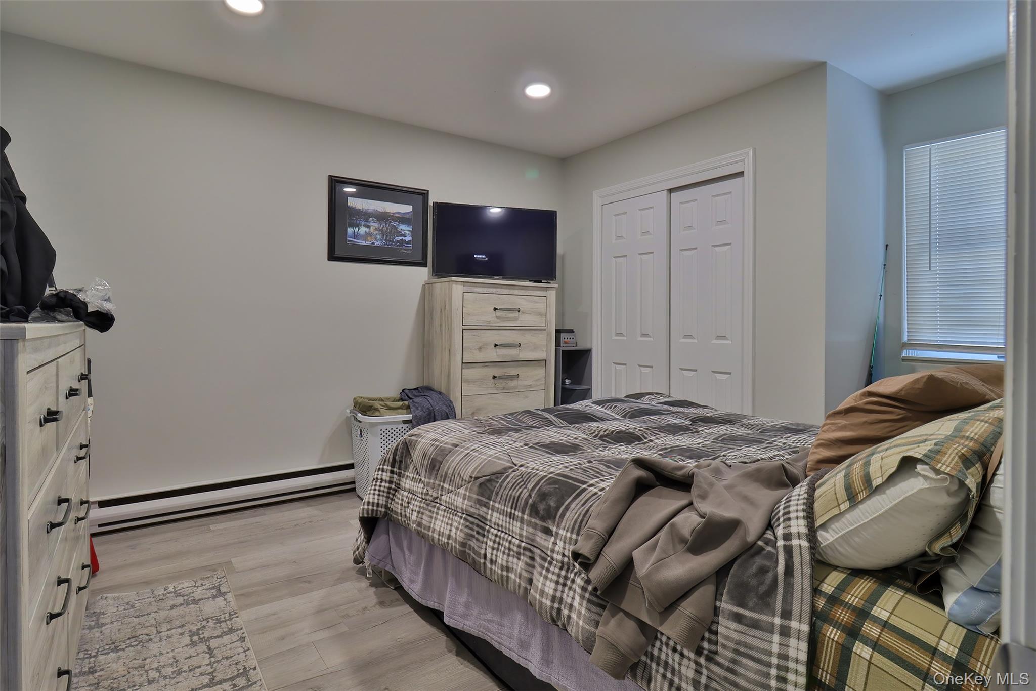 116 B Holbrook Road Holbrook, NY 11741 - Photo 23 of 23 a bedroom with a bed and furniture