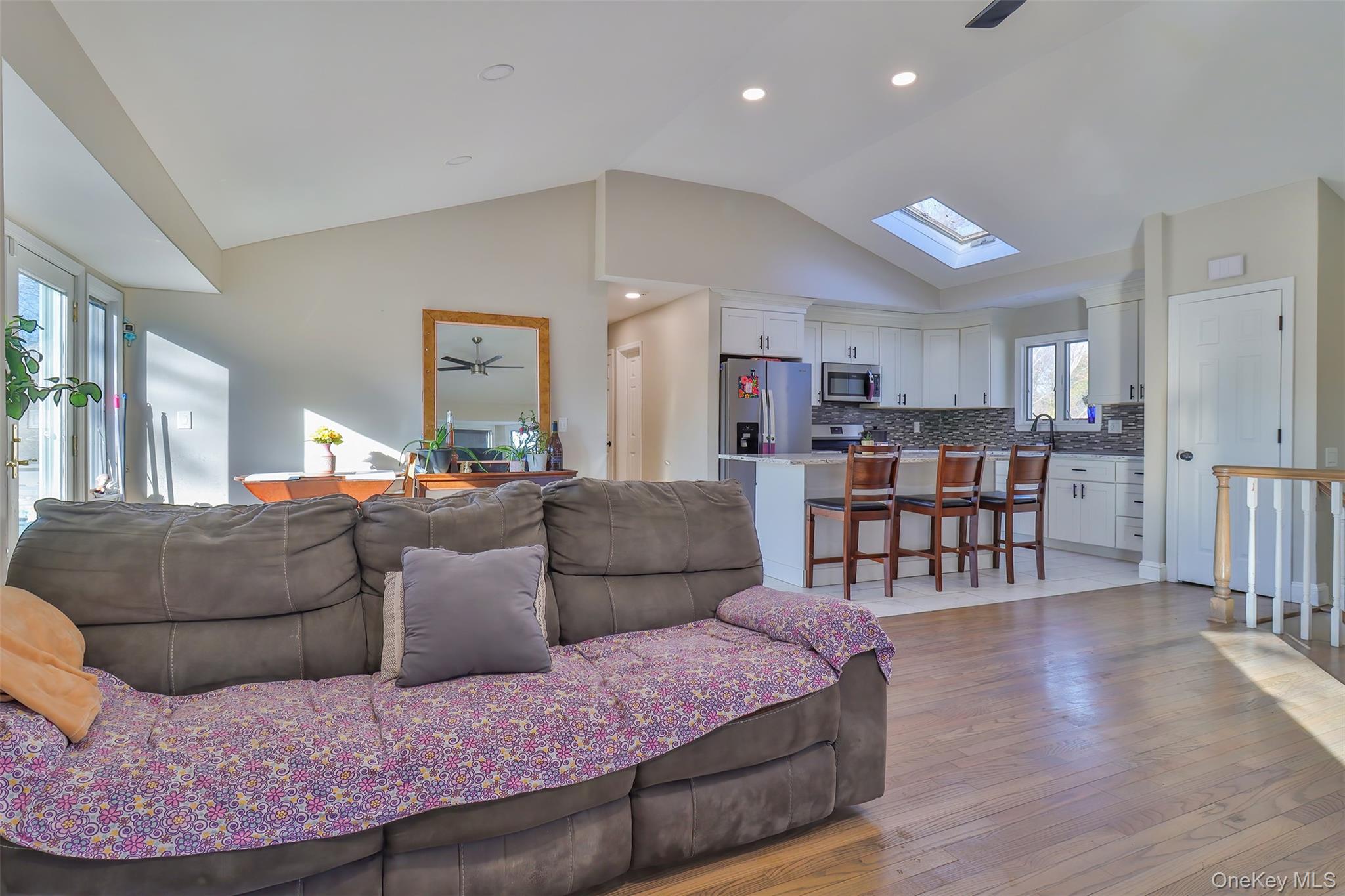 116 B Holbrook Road Holbrook, NY 11741 - Photo 7 of 23 a living room with furniture and wooden floor