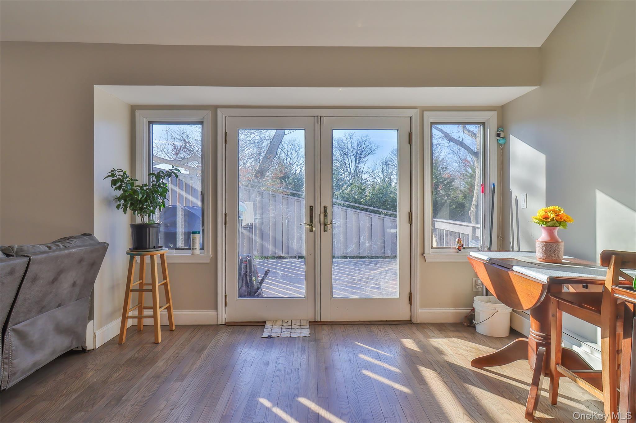 116 B Holbrook Road Holbrook, NY 11741 - Photo 8 of 23 a living room with furniture and wooden floor
