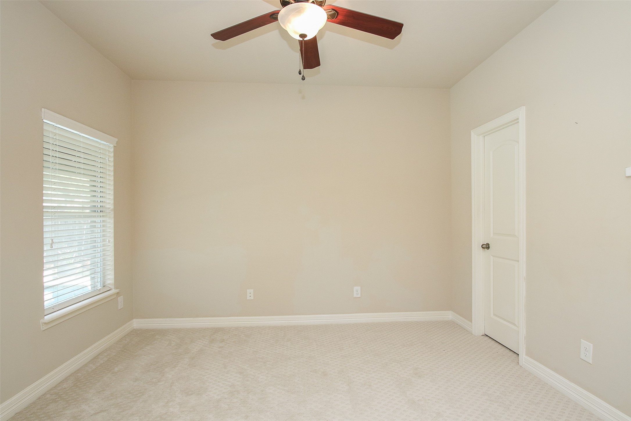11722 Spriggs Way Houston, TX 77024 - Photo 28 of 49 Downstairs second bedroom for guests/mother in law suite or possibly a workout room.