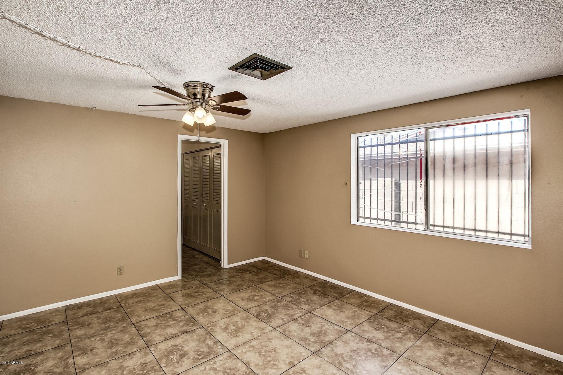3707 West Griswold Road Phoenix, AZ 85051 - Photo 34 of 47 master bedroom view 2