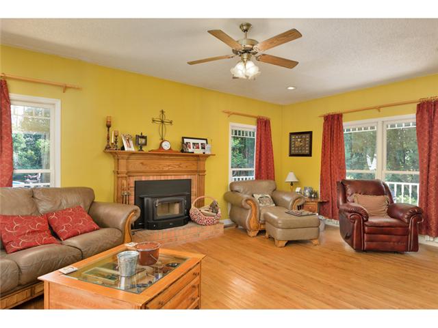 1967 Alf Harris Road Prospect, TN 38477 - Photo 2 of 20 22x15 Living Room with wood burning fireplace.