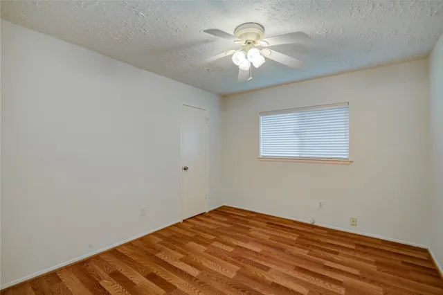 a view of a room with a large window
