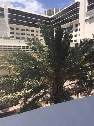 a view of swimming pool from a window