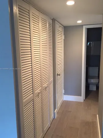 a view of a room with a window