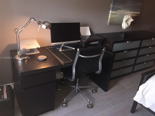 a picture of a room with gym equipment